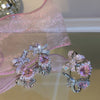 Lovely diamond bow ring + earrings PL51742