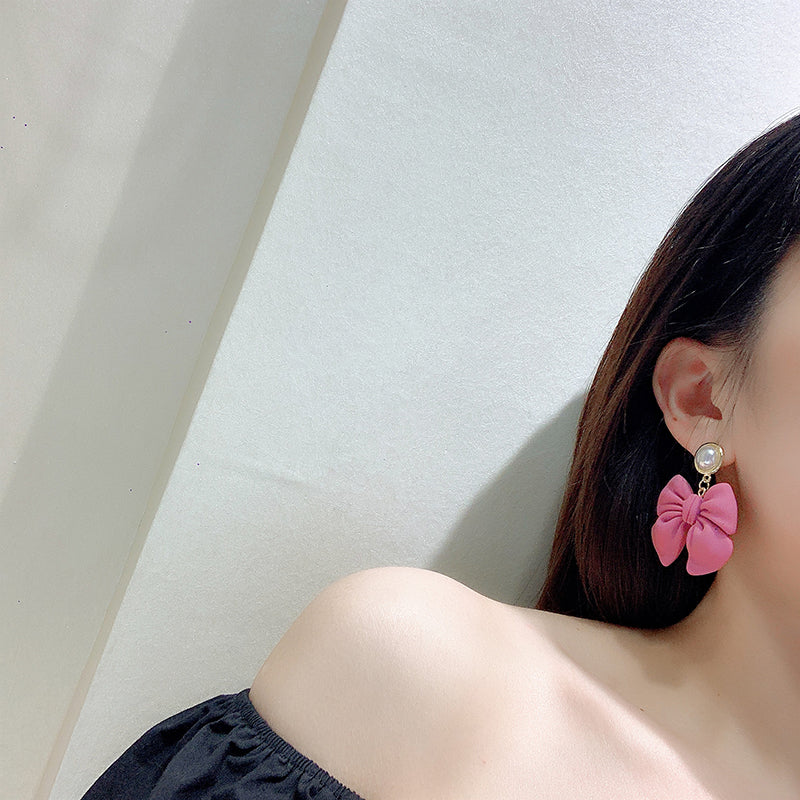 Loved pink bow earrings PL51901